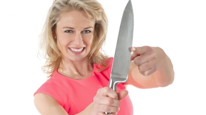 woman-long-kitchen-knife-beautiful-blond-holding-cutting-her-index-finger-blade-31575683